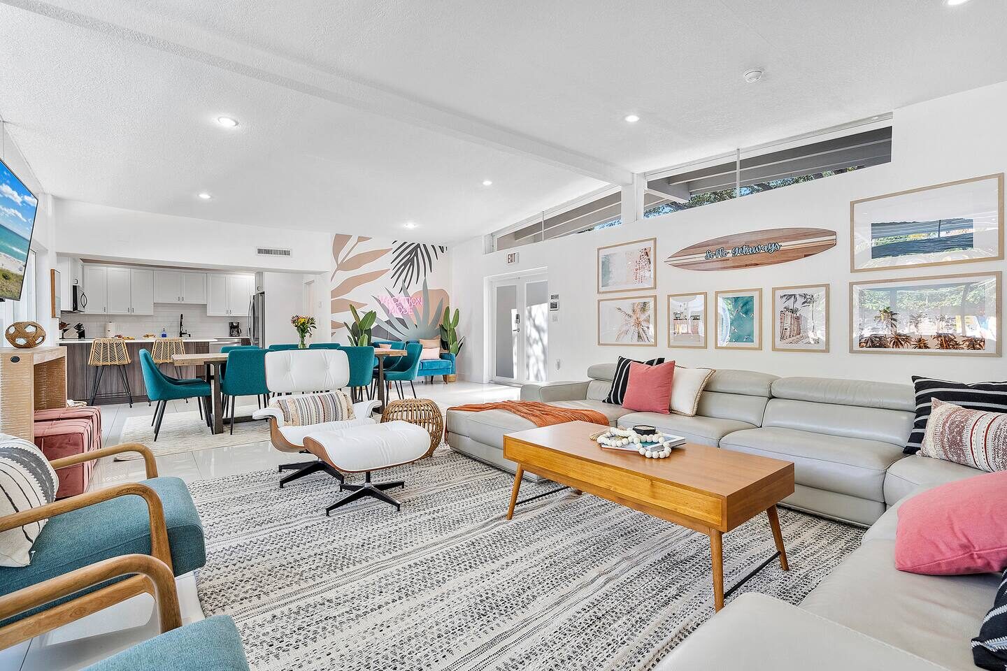 Modern bright living room with large gray sectional